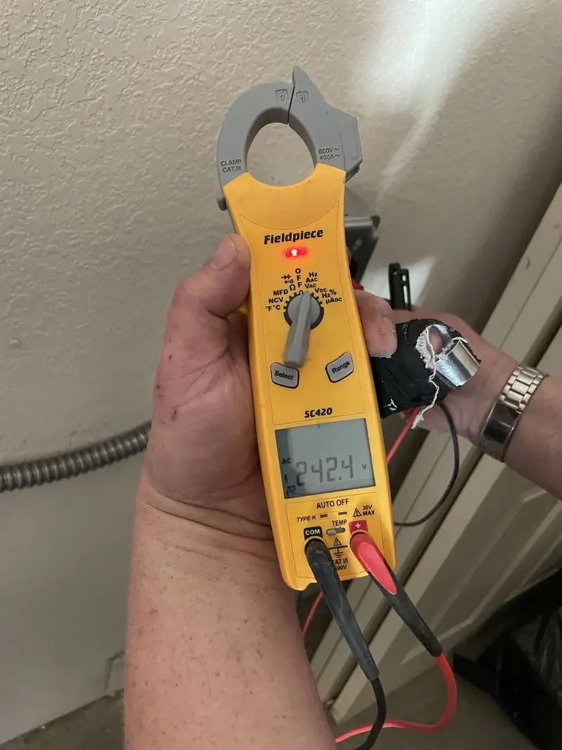 Voltage testing with clamp meter during Circuit Breaker Repair in Hartwell